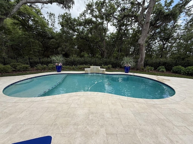 view of pool with a fenced backyard, a patio area, and a fenced in pool