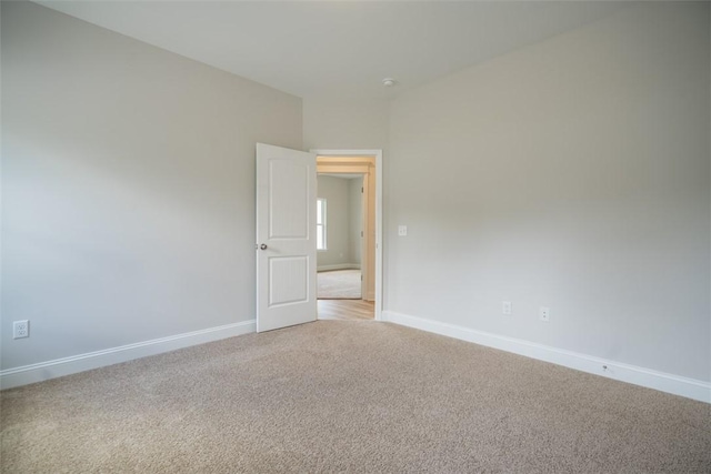 860 Kaitlyn Ave, Odum, GA 31555 - spare room featuring light colored carpet