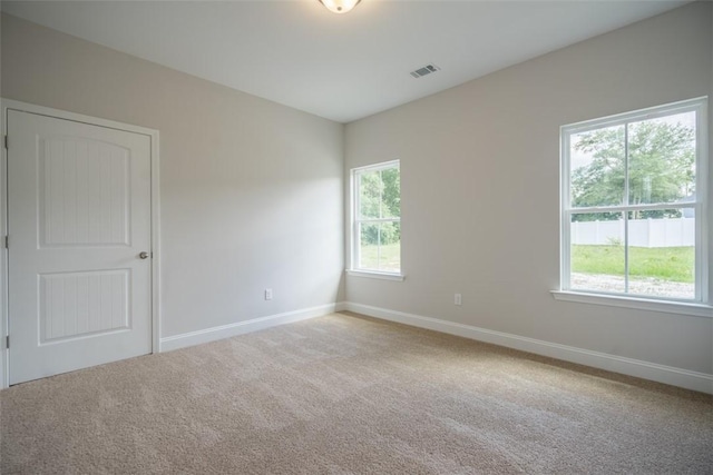 860 Kaitlyn Ave, Odum, GA 31555 - view of carpeted spare room