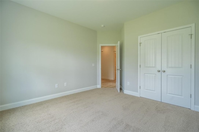 860 Kaitlyn Ave, Odum, GA 31555 - unfurnished bedroom with light carpet and a closet