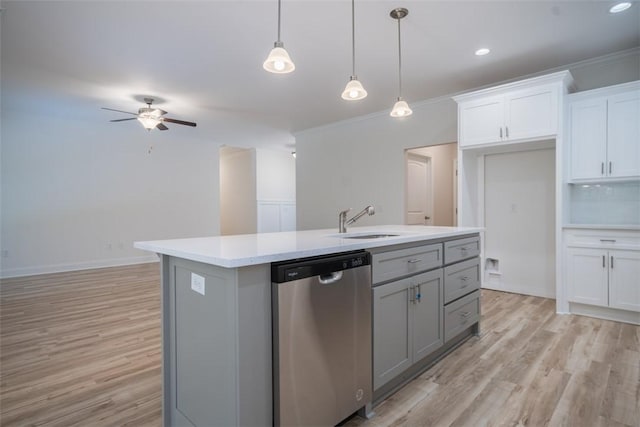 860 Kaitlyn Ave, Odum, GA 31555 - kitchen with pendant lighting, dishwasher, crown molding, ceiling fan, and white cabinetry