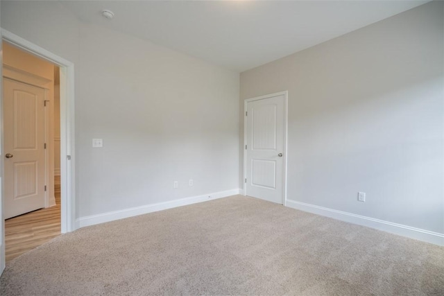 860 Kaitlyn Ave, Odum, GA 31555 - empty room featuring light carpet