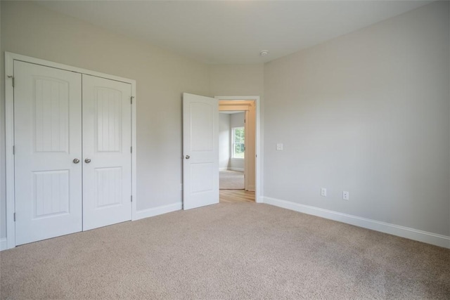860 Kaitlyn Ave, Odum, GA 31555 - unfurnished bedroom with light carpet and a closet