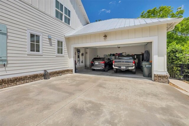 garage with concrete driveway