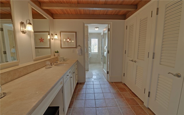 bathroom featuring beamed ceiling, vanity, an enclosed shower, and wooden ceiling