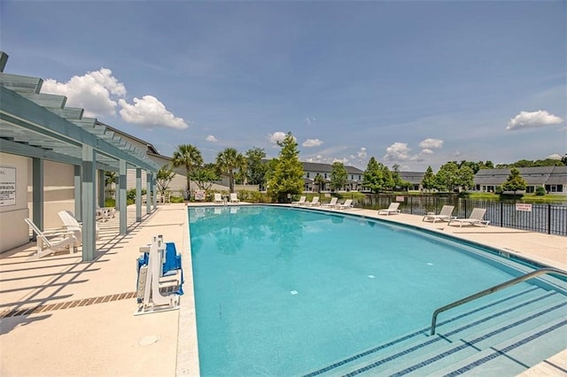 view of swimming pool featuring a patio area