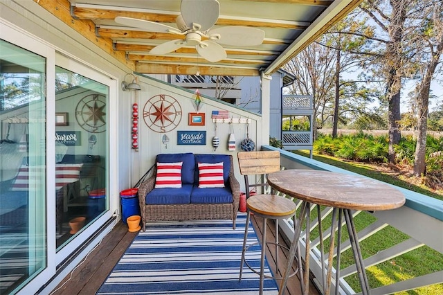 view of patio featuring ceiling fan