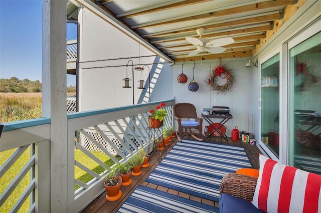 balcony featuring ceiling fan