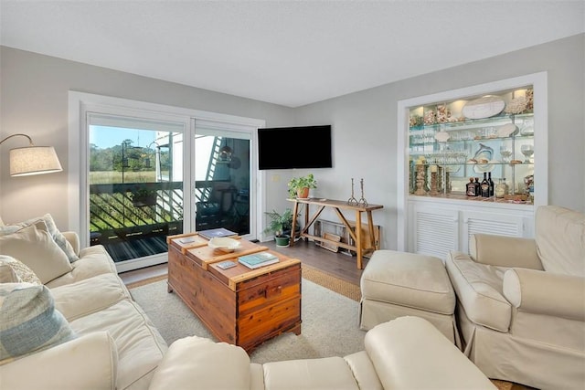 living room with light hardwood / wood-style flooring