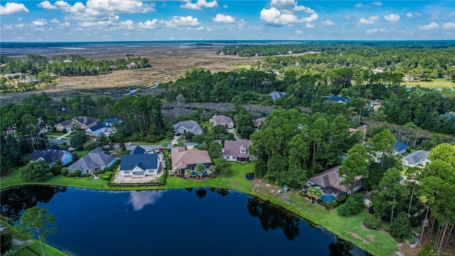 aerial view featuring a residential view and a water view