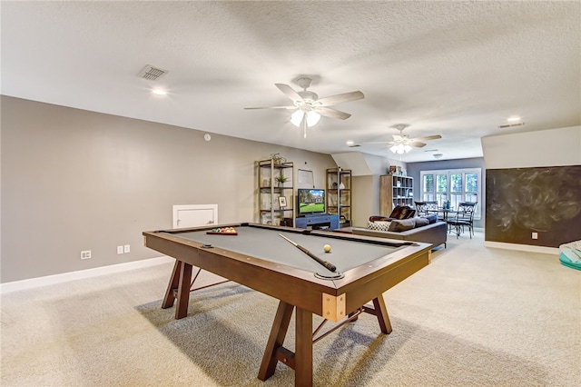 rec room featuring light carpet, visible vents, baseboards, pool table, and a textured ceiling