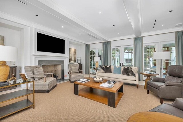 carpeted living room featuring beam ceiling, french doors, and ornamental molding