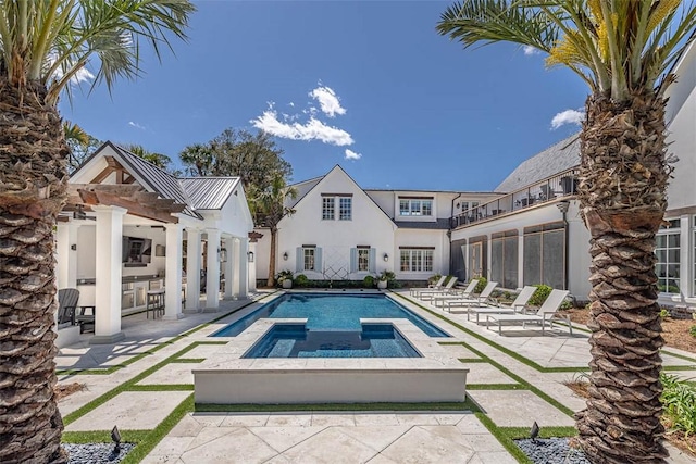 view of pool with a patio