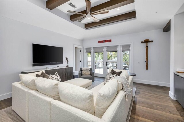 living room featuring beamed ceiling, french doors, ceiling fan, and wood-type flooring