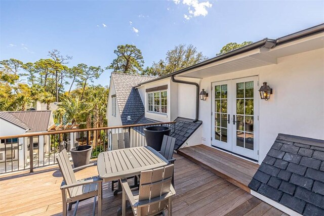 wooden deck featuring french doors