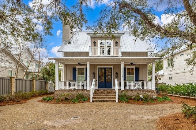 view of front facade with french doors and covered porch