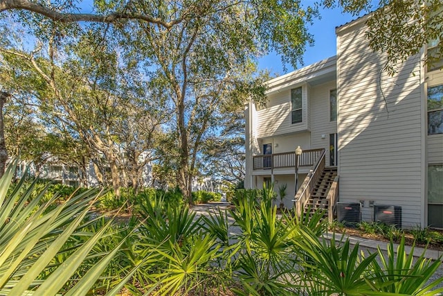 1175 N Beachview Dr Unit 279, Jekyll Island, GA 31527 - view of yard featuring stairs and central air condition unit