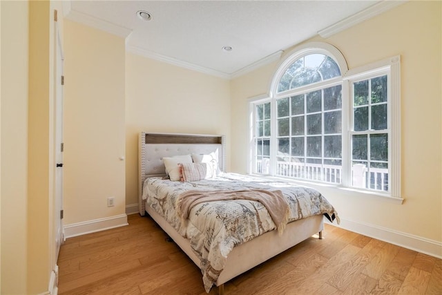 1151 W Mission Ln SE, Darien, GA 31305 - bedroom with wood finished floors, ornamental molding, and baseboards