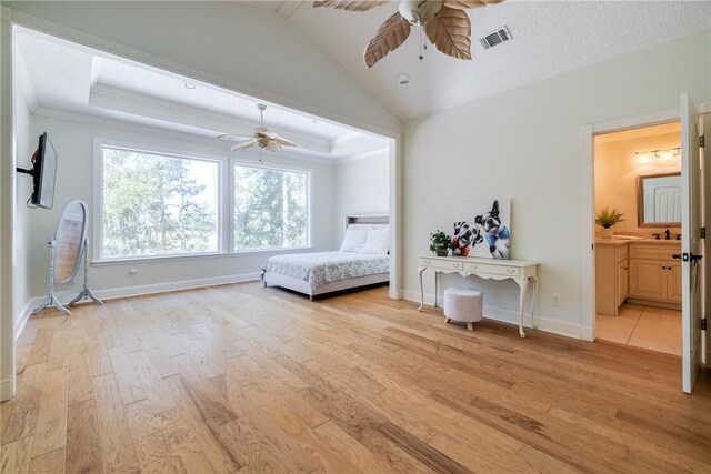 1151 W Mission Ln SE, Darien, GA 31305 - bedroom with light wood finished floors, baseboards, ensuite bathroom, a ceiling fan, and ornamental molding