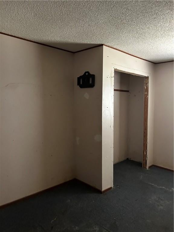 802 Congress St, Waycross, GA 31501 - unfurnished bedroom with a textured ceiling and a closet