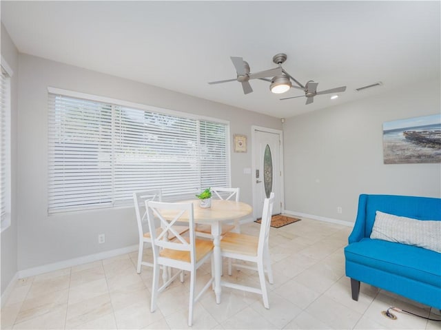900 Mallory St, Saint Simons Island, GA 31522 - dining area with a ceiling fan, healthy amount of natural light, and baseboards