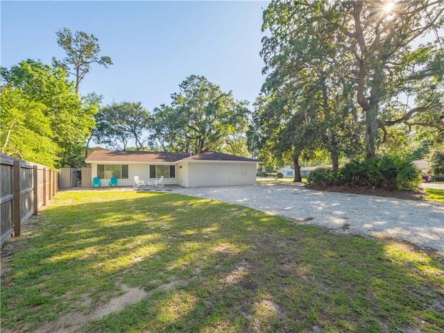 900 Mallory St, Saint Simons Island, GA 31522 - single story home featuring driveway and a patio
