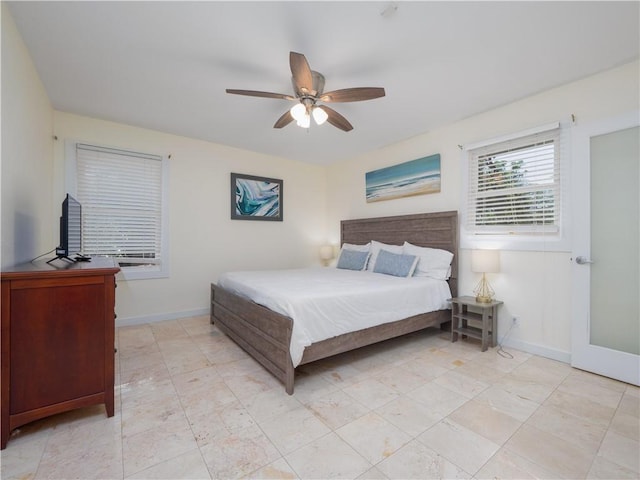 900 Mallory St, Saint Simons Island, GA 31522 - bedroom with baseboards and a ceiling fan