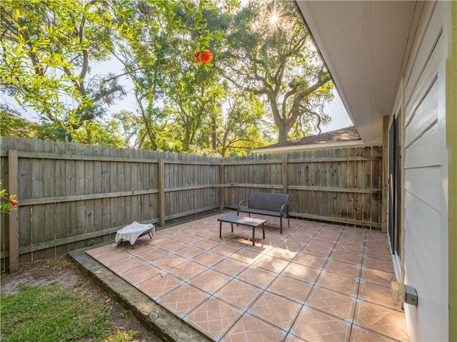 900 Mallory St, Saint Simons Island, GA 31522 - fenced backyard featuring a patio area