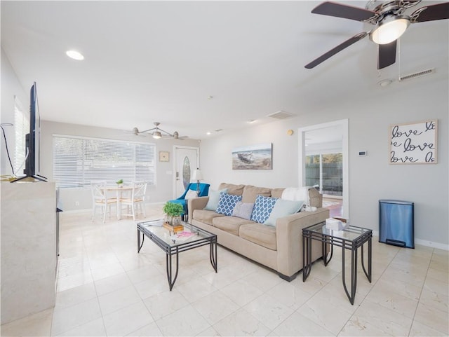 900 Mallory St, Saint Simons Island, GA 31522 - living room with healthy amount of natural light, ceiling fan, baseboards, and recessed lighting