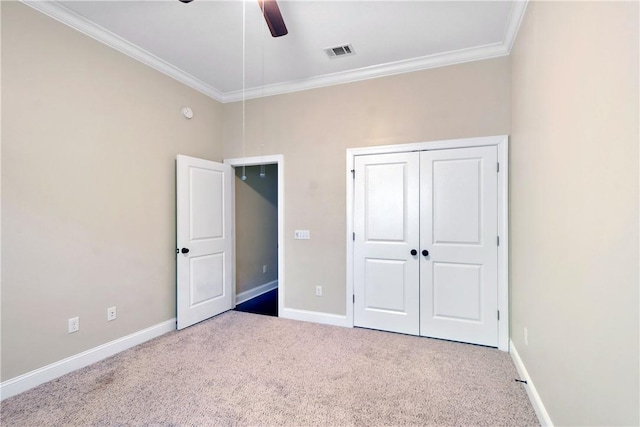 168 Township Bluff Cir, Saint Simons Island, GA 31522 - unfurnished bedroom featuring carpet, a closet, ceiling fan, and ornamental molding