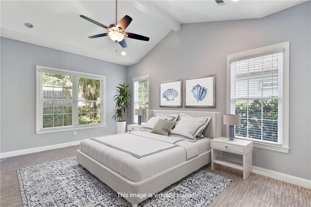 168 Township Bluff Cir, Saint Simons Island, GA 31522 - bedroom with hardwood / wood-style floors, high vaulted ceiling, ceiling fan, and beam ceiling