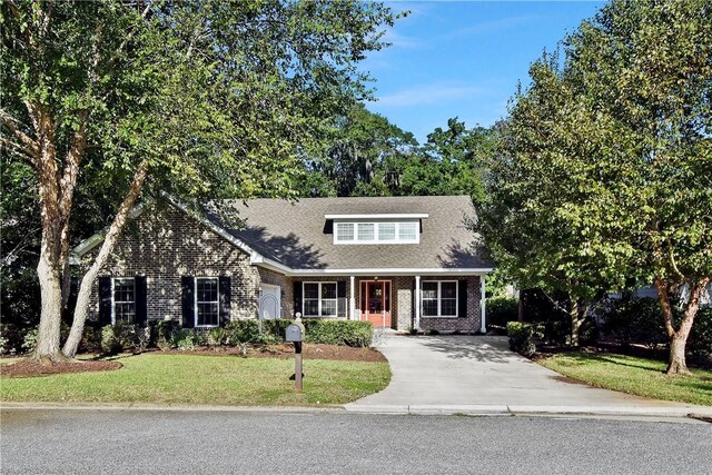 168 Township Bluff Cir, Saint Simons Island, GA 31522 - view of front of property with a front lawn
