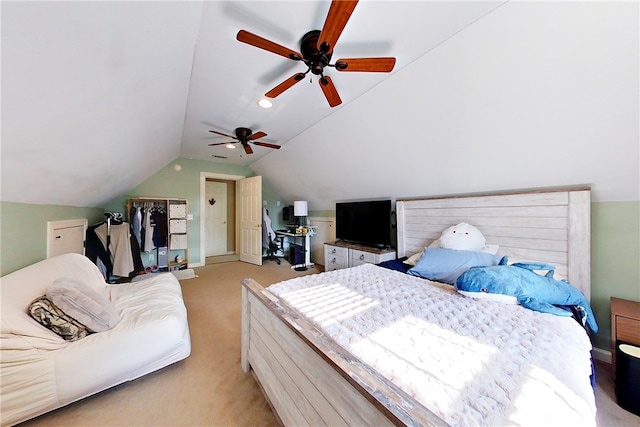 bedroom featuring ceiling fan, light colored carpet, and lofted ceiling