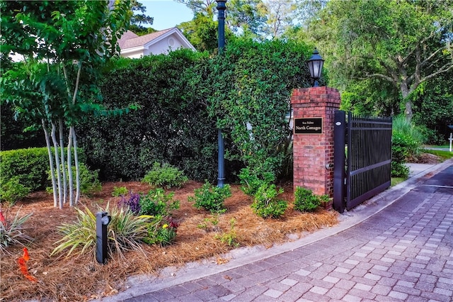 163 N Cottages Dr, Saint Simons Island, GA 31522 - community / neighborhood sign featuring a gate