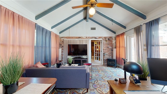 living room featuring ornamental molding, ceiling fan, beam ceiling, high vaulted ceiling, and a wood stove