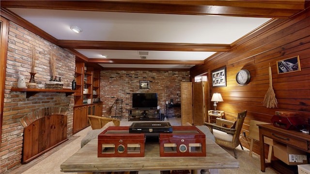 living room featuring beam ceiling, light colored carpet, and wooden walls