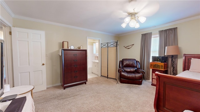 bedroom with ensuite bathroom, ceiling fan, light colored carpet, and ornamental molding