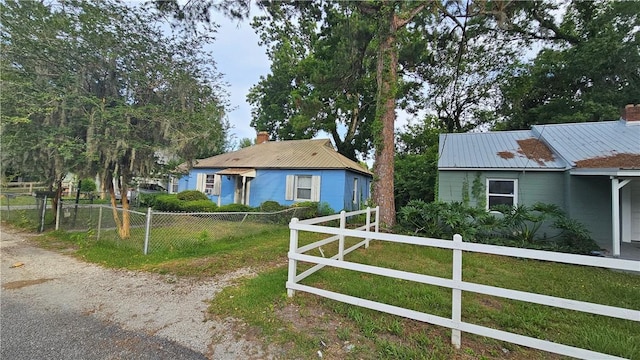 view of front of home with a front lawn