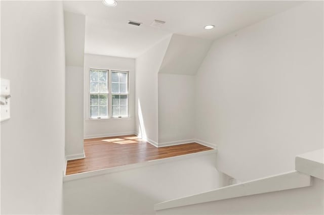 104 Augusta, Saint Simons Island, GA 31522 - additional living space featuring recessed lighting, baseboards, visible vents, and wood finished floors