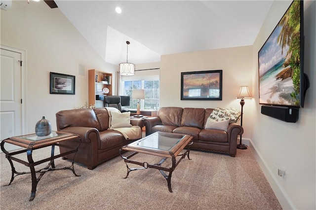 living area with light carpet, vaulted ceiling, and baseboards