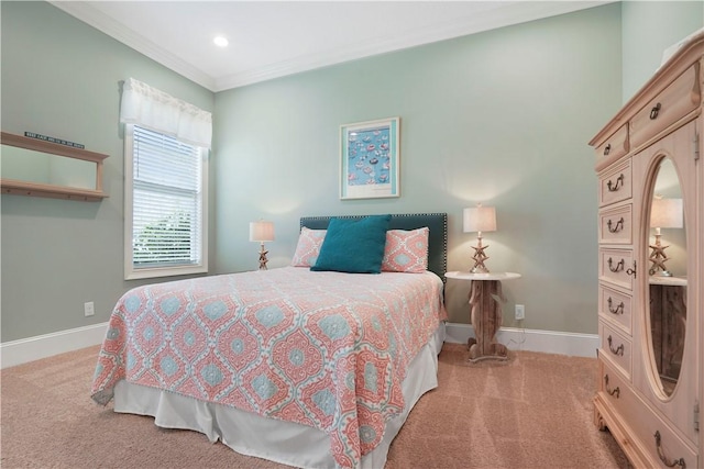 bedroom with carpet floors, recessed lighting, ornamental molding, and baseboards