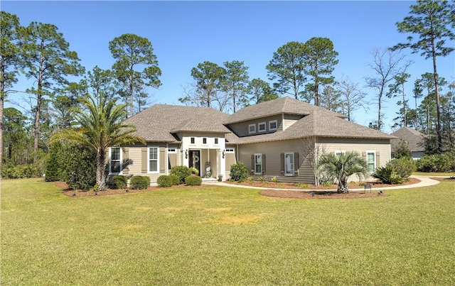 view of front of home featuring a front lawn