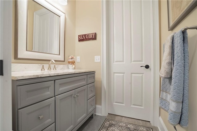 bathroom with vanity and tile patterned floors