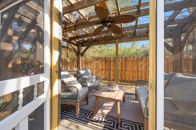 exterior space with a ceiling fan, fence, an outdoor hangout area, and a pergola