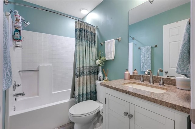 bathroom featuring shower / bath combo, vanity, and toilet