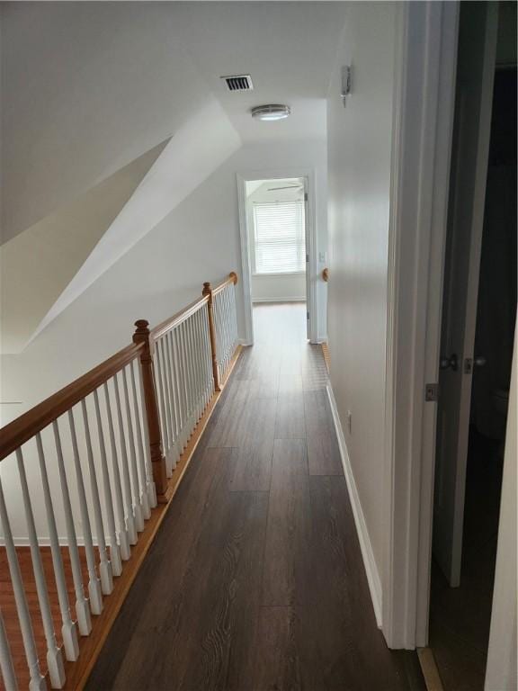 115 Simonton Way, Saint Simons Island, GA 31522 - hall featuring lofted ceiling and dark wood-type flooring