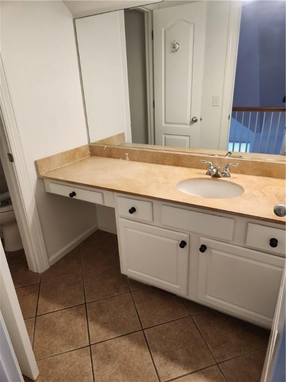 115 Simonton Way, Saint Simons Island, GA 31522 - bathroom featuring tile patterned floors, vanity, and toilet