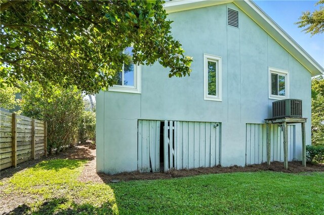 310 Peachtree St, Saint Simons Island, GA 31522 - view of property exterior with stucco siding