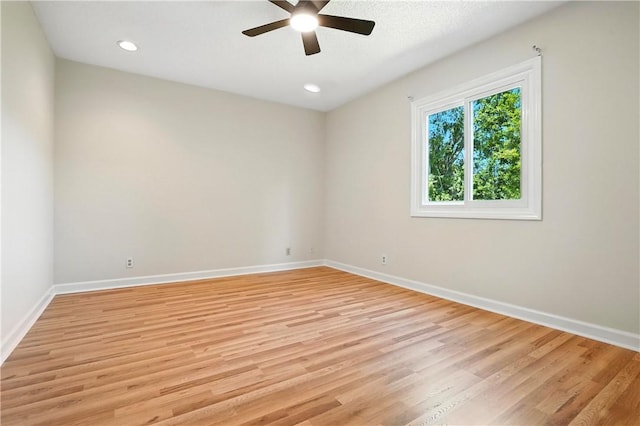 310 Peachtree St, Saint Simons Island, GA 31522 - spare room with a ceiling fan, light wood finished floors, and recessed lighting