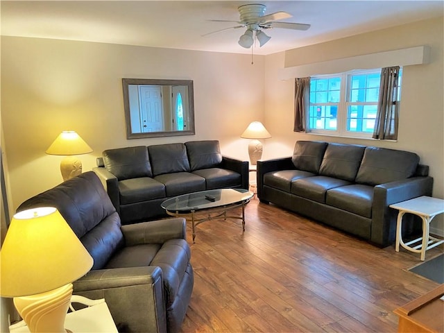 living room featuring wood finished floors and ceiling fan